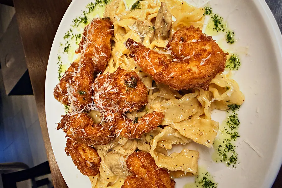 Creamy ribbon pasta with crispy prawns and parmesan